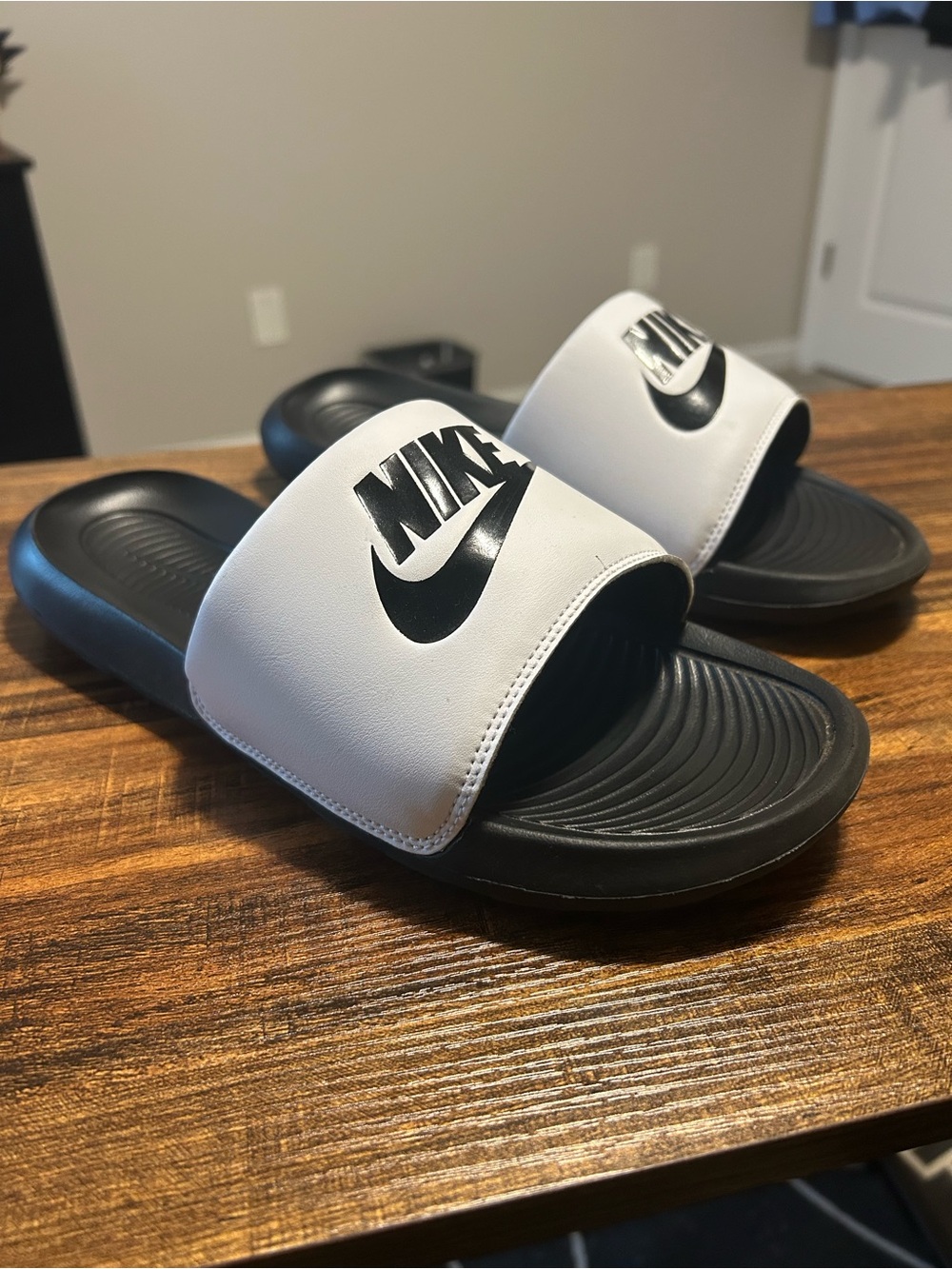 Nike Black and White Slide Sandals with Logo Strap